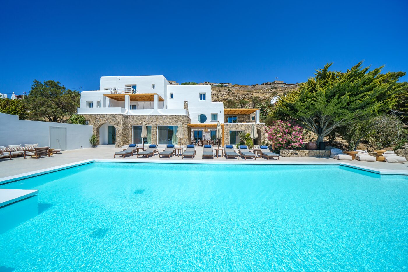 Infinity pool edge overlooking the Aegean at Primadonna, Mykonos