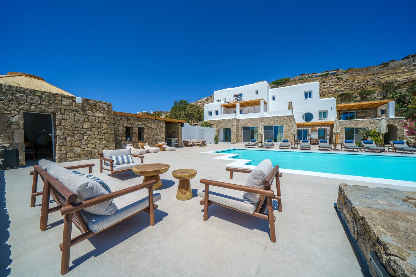 Daybed and sun loungers on the pool terrace in Mykonos