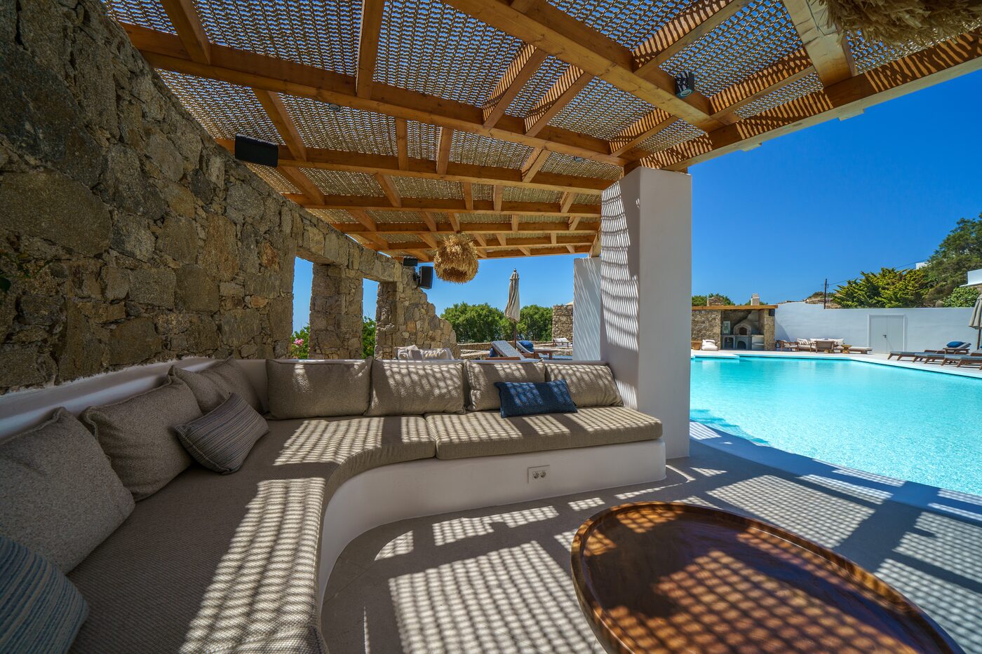 Covered terrace lounge looking out to the infinity pool, Mykonos